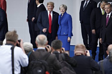 11 Temmuz 2018 - Brüksel, Belçika - ABD Başkanı Donald J. Trump ve İngiltere Başbakanı Theresa May, Belçika'nın başkenti Brüksel'de düzenlenen NATO Zirvesi 2018'de.