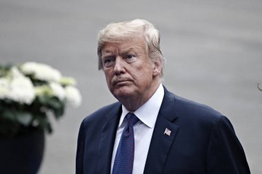 US President Donald Trump and First Lady of the US Melania Trump arrive for a working dinner at The Parc du Cinquantenaire in Brussels, Belgium on Jul. 11, 2018. clipart