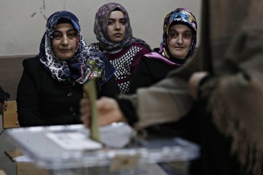 People wait to cast their vote during general elections at a polling station in Istanbul, Turkey on Nov. 1, 2015