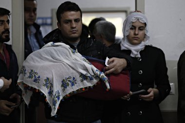 People wait to cast their vote during general elections at a polling station in Istanbul, Turkey on Nov. 1, 2015