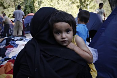Bazı 1500 göçmenlerin ve mültecilerin Atina 'da, Yunanistan 'da, 3 Ağustos 2015 tarihinde yer alan bir kampta yaşayan Pedion tou Areos parkında mülteci ve göçmen bir kampta