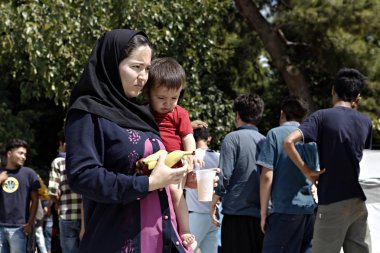 Bazı 1500 göçmenlerin ve mültecilerin Atina 'da, Yunanistan 'da, 9 Ağustos 2015 tarihinde yer alan bir kampta yaşayan Pedion tou Areos parkında mülteci ve göçmen bir kampta.