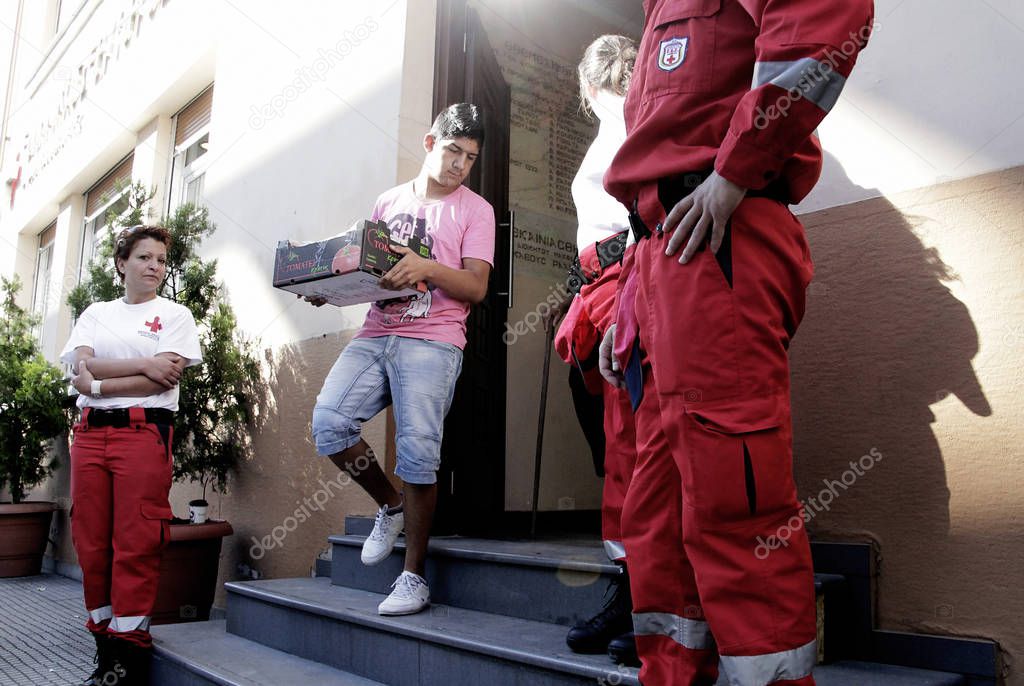Volunteers of the Greek department of Red Cross, handed out vegetables donated by Cretan farmers to needy families in Thessaloniki, Greece on Jun. 1, 2013