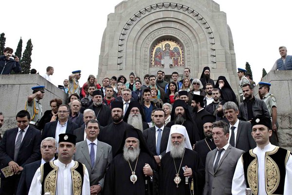 Serbian Orthodox Church Patriarch Irinej arrives to serve memorial service to victims of World War I at the Serbian military cemetery of Zeitenlik in Thessaloniki, Greece on Oct. 18, 2014