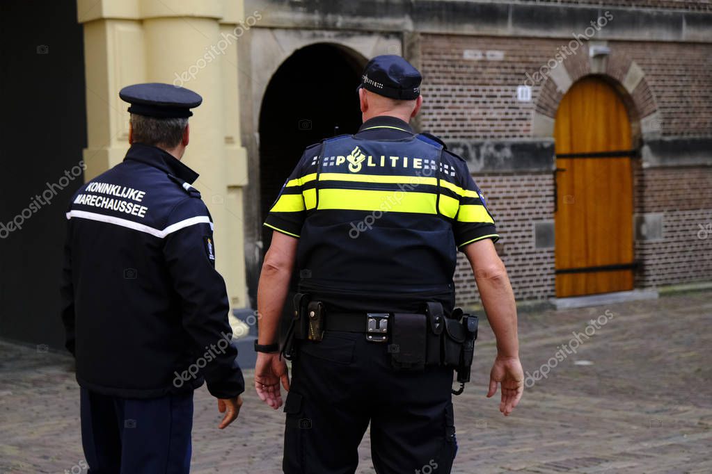 A Dutch policeman secures the area outside of Prime Minister office's in The Hague, Netherlands on Aug. 3, 2019.