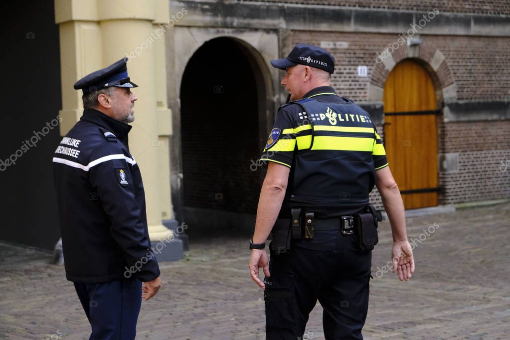 A Dutch policeman secures the area outside of Prime Minister office's in The Hague, Netherlands on Aug. 3, 2019.