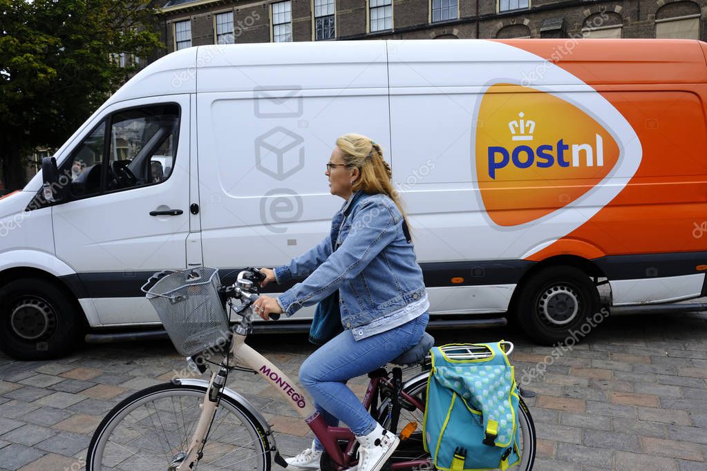 A car of Royal PostNL company in street of The Hague, Netherlands on Sep. 3, 2019.