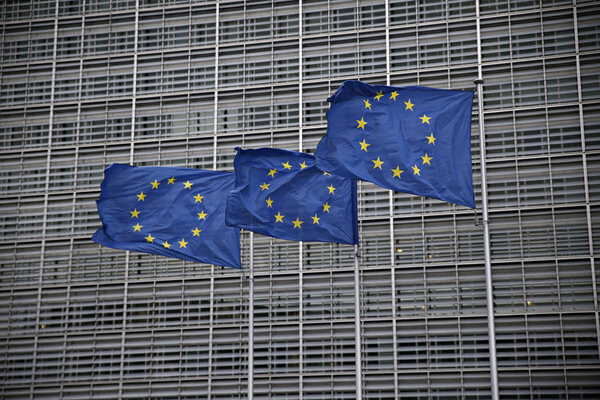 Brussels, Belgium. 26th Sep. 2019. European flags flap in the wind outside EU headquarters.