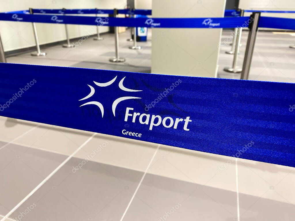 Cord with logo of Fraport in airport of Mytilene, Greece on March 9, 2020