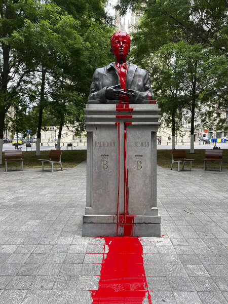 A picture taken on June 12, 2020 shows the vandalised statue of King Baudouin of Belgium (1930 - 1993) in front of Saint Michael and Gudula Cathedral, in the center of Brussels.