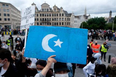 Brussels, Belgium. 5th July 2020. Protesters take part in a rally against Belgium's Constitutional Court rule to prohibit the use of head scarfs in Universities. clipart