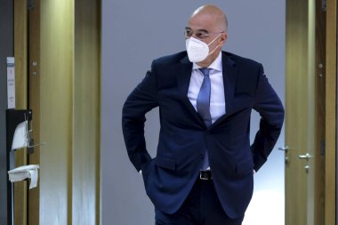 Brüksel, Belçika. 21 Eylül 2020. Yunanistan Dışişleri Bakanları Nikos Dendias, AB dışişleri bakanlarının Avrupa Konseyi binasına yaptıkları toplantıya katılmak üzere geldi