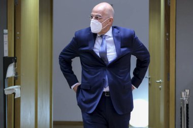 Brüksel, Belçika. 21 Eylül 2020. Yunanistan Dışişleri Bakanları Nikos Dendias, AB dışişleri bakanlarının Avrupa Konseyi binasına yaptıkları toplantıya katılmak üzere geldi