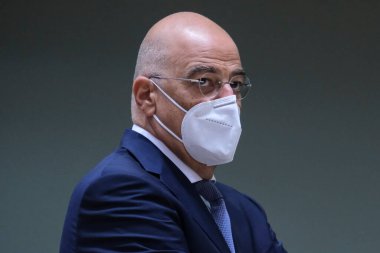 Brüksel, Belçika. 21 Eylül 2020. Yunanistan Dışişleri Bakanları Nikos Dendias, AB dışişleri bakanlarının Avrupa Konseyi binasına yaptıkları toplantıya katılmak üzere geldi