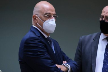 Brüksel, Belçika. 21 Eylül 2020. Yunanistan Dışişleri Bakanları Nikos Dendias, AB dışişleri bakanlarının Avrupa Konseyi binasına yaptıkları toplantıya katılmak üzere geldi