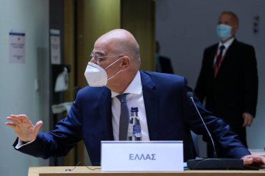 Brüksel, Belçika. 21 Eylül 2020. Yunanistan Dışişleri Bakanları Nikos Dendias, AB dışişleri bakanlarının Avrupa Konseyi binasına yaptıkları toplantıya katılmak üzere geldi