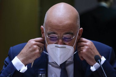 Brüksel, Belçika. 21 Eylül 2020. Yunanistan Dışişleri Bakanları Nikos Dendias, AB dışişleri bakanlarının Avrupa Konseyi binasına yaptıkları toplantıya katılmak üzere geldi