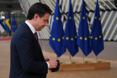 Italian Prime Minister Giuseppe Conte arrives at the first face-to-face EU summit since the coronavirus disease (COVID-19) outbreak, in Brussels, Belgium July 17, 2020. clipart