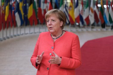 German Chancellor Angela Merkel arrives to attend the European Union leaders summit in Brussels, Belgium July 17, 2020. clipart