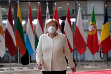 German Chancellor Angela Merkel arrives to attend the European Union leaders summit in Brussels, Belgium July 19, 2020. clipart