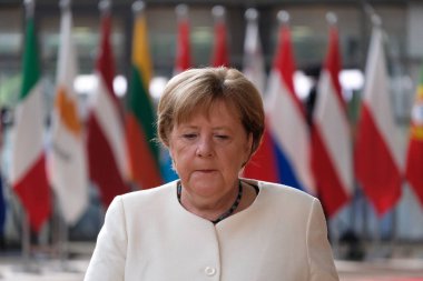 German Chancellor Angela Merkel arrives to attend the European Union leaders summit in Brussels, Belgium July 19, 2020. clipart