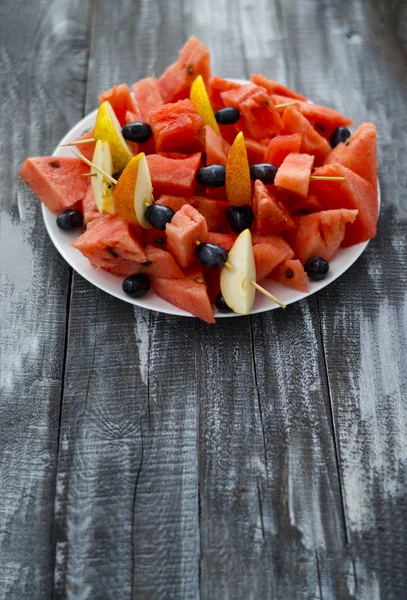 Red sliced watermelon into slices — Stock Photo, Image