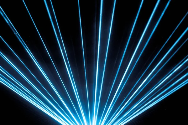 Blue laser show nightlife club stage and shining sparkling rays — Stock Photo, Image