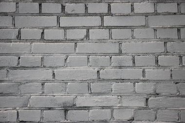 Açık gri, eski, yıpranmış tuğla duvar dokusu arka plan.