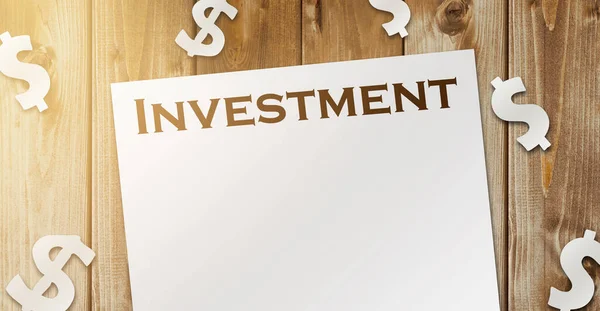 Investment Word Page Paper Dollar Signs Wooden Table Financial Business — Stock Photo, Image