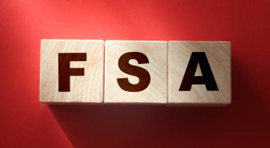 FSA 'nın kırmızı arka plandaki kısaltması. Esnek Harcama Hesabı finansal konsepti.