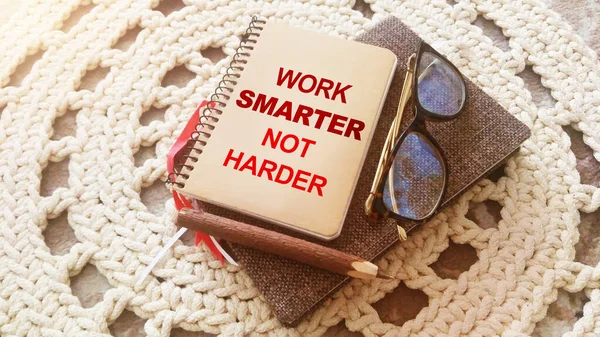 Ручка Очки Спиральный Ноутбук Work Smarter Harder Слова Вязаном Фоне — стоковое фото