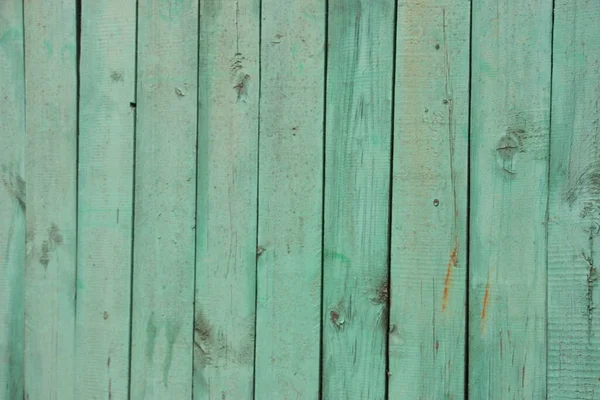 被风吹日晒的薄荷绿色木板的背景 — 图库照片