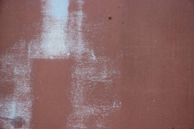 Grunge arkaplan, açık mavi ve paslı kahverengi yüzey.