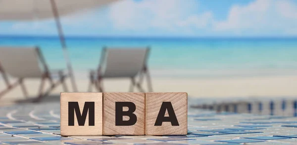 MBA Spelled Out in Alphabet Building Blocks. Master of Business Administration concept. Education overseas.