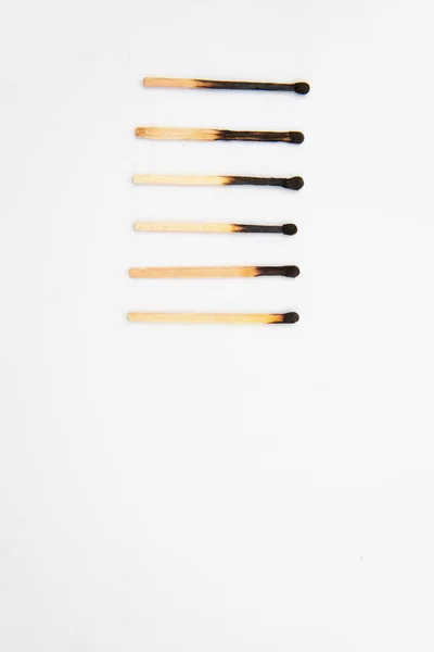 Different Stages Burning Matches Matches Stand Row White Background — Stock Photo, Image