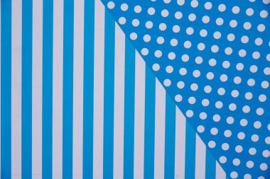 Geometri tarzında modaya uygun kağıtların doku arka planı. Mavi arkaplandaki kağıt.