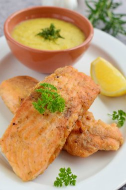 Fried salmon fish with mashed potato