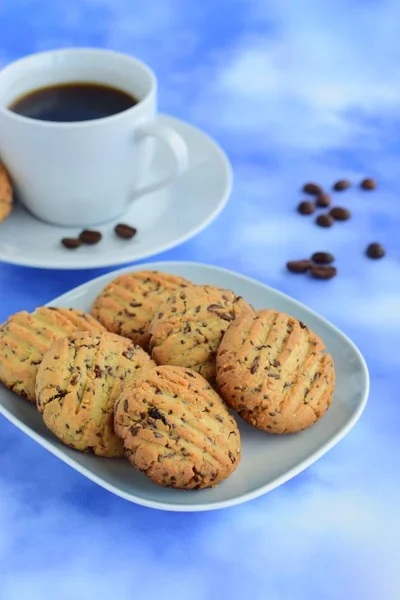 Cookies Chocolate Sprinkles Served Cup Coffee Blue Background — Stock Photo, Image