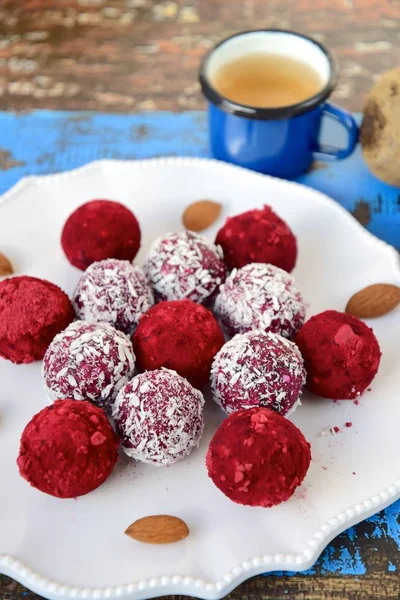 Homemade vegan date almond quinoa coconut beetroot bliss balls