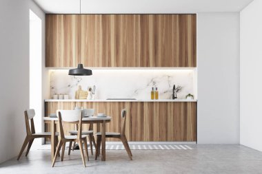 Beyaz mutfak iç gri mutfak tezgahı, yuvarlak ahşap masa ve sandalyeler duruyor. Yukarıda asılı tavan lambası. 3D render alay