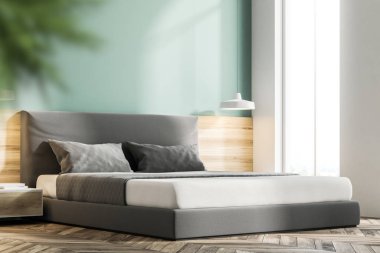 Yeşil yatak odası iç ahşap zemin ve bir yatak. Bir yandan görünüm ve yakın bir yukarı. 3D render alay