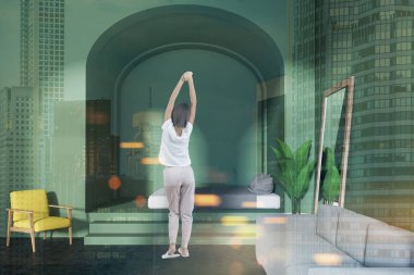 Gri bir kanepe, bir yatak piedestal ve uzun boylu ayna ayakta duvarının yakınında rahat bir yatak odası iç. Bir kadın pijama. 3D render alay