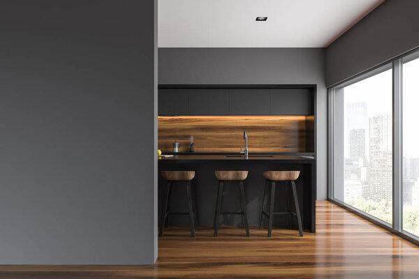 Gray and wooden wall kitchen interior with gray countertops, a bar with stools and a dining room table. 3d rendering A mock up on the left