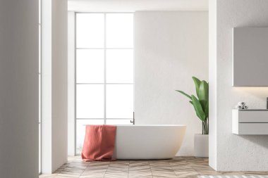 O bir modern banyo iç beyaz duvarlı ayakta asılı kırmızı bir havlu ile beyaz küvet. Sağdaki bir lavabo. 3D render alay