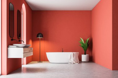 Beyaz bir küvet, bir çift lavabo saksı bir ağaç ve bir lamba köşesinde asılı bir havlu ile minimalist kırmızı banyo iç. 3D render alay