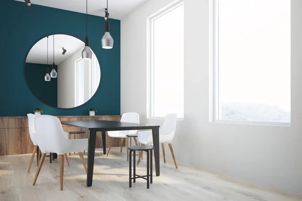 Dark green and white wall dining room corner with a black table, white and black chairs and a round mirror on the wall. A family values concept. 3d rendering