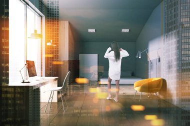 Yatak odası ve ev ofis iç Gri duvarlar, bir çift kişilik yatak, bir bilgisayar masa ve sarı bir koltuk. Bir kadın. 3D render sahte kadar çift tonlu görüntü pozlaması