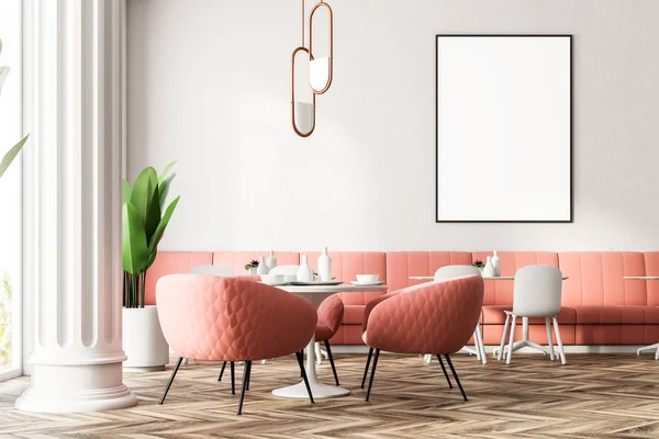 Round table with pink armchairs standing near it. Large windows and columns. Modern restaurant interior with pink sofas. A vertical mock up poster frame 3d rendering