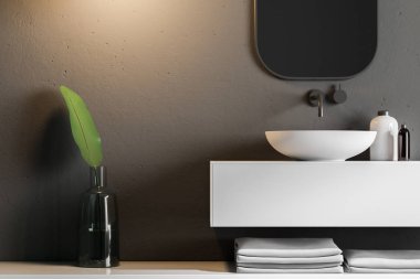 Beyaz bir tezgah ve dikey bir ayna üzerinde asılı duran bir lavabo banyo iç siyah duvarlı. A yakın çekim. 3D render