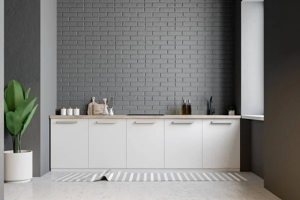Grijze Bakstenen Keuken Interieur Met Witte Werkbladen Een Ingemaakte Installatie — Stockfoto